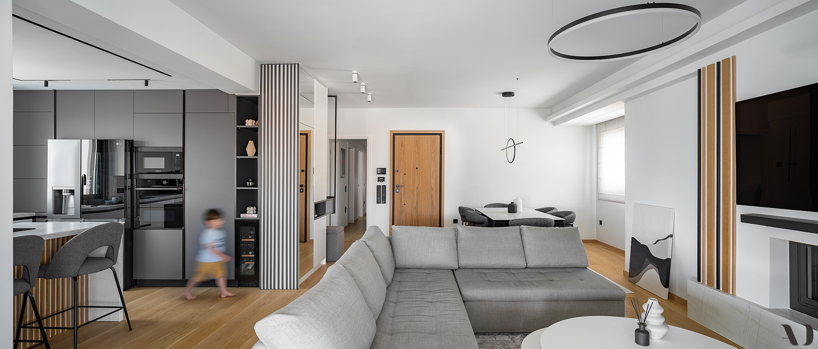 Linear Glow interior design with integrated architectural lighting throughout open-plan space.